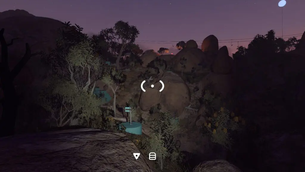 A blue-route radio beside the rock face